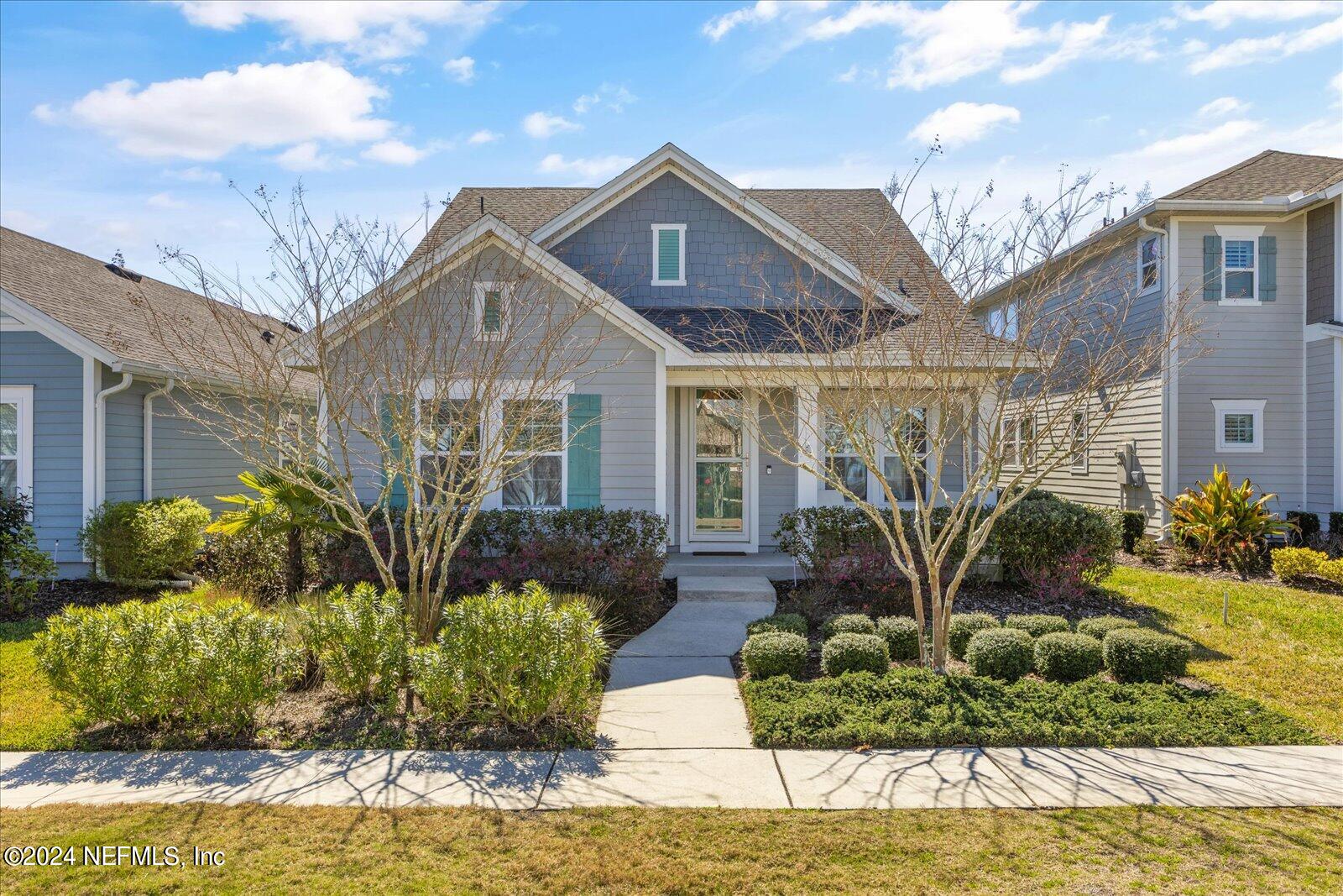 36 Foster Lane Ponte Vedra, FL 32081 - Photo 2 of 59 a front view of a house with garden