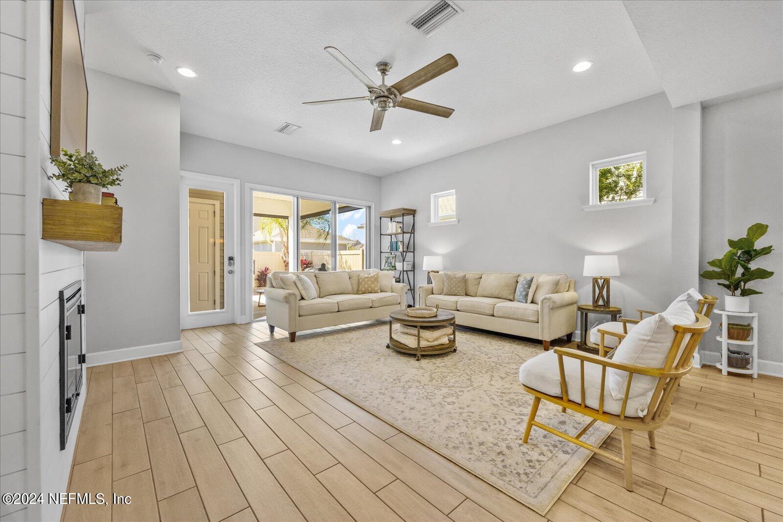 36 Foster Lane Ponte Vedra, FL 32081 - Photo 29 of 59 a living room with furniture and a large window