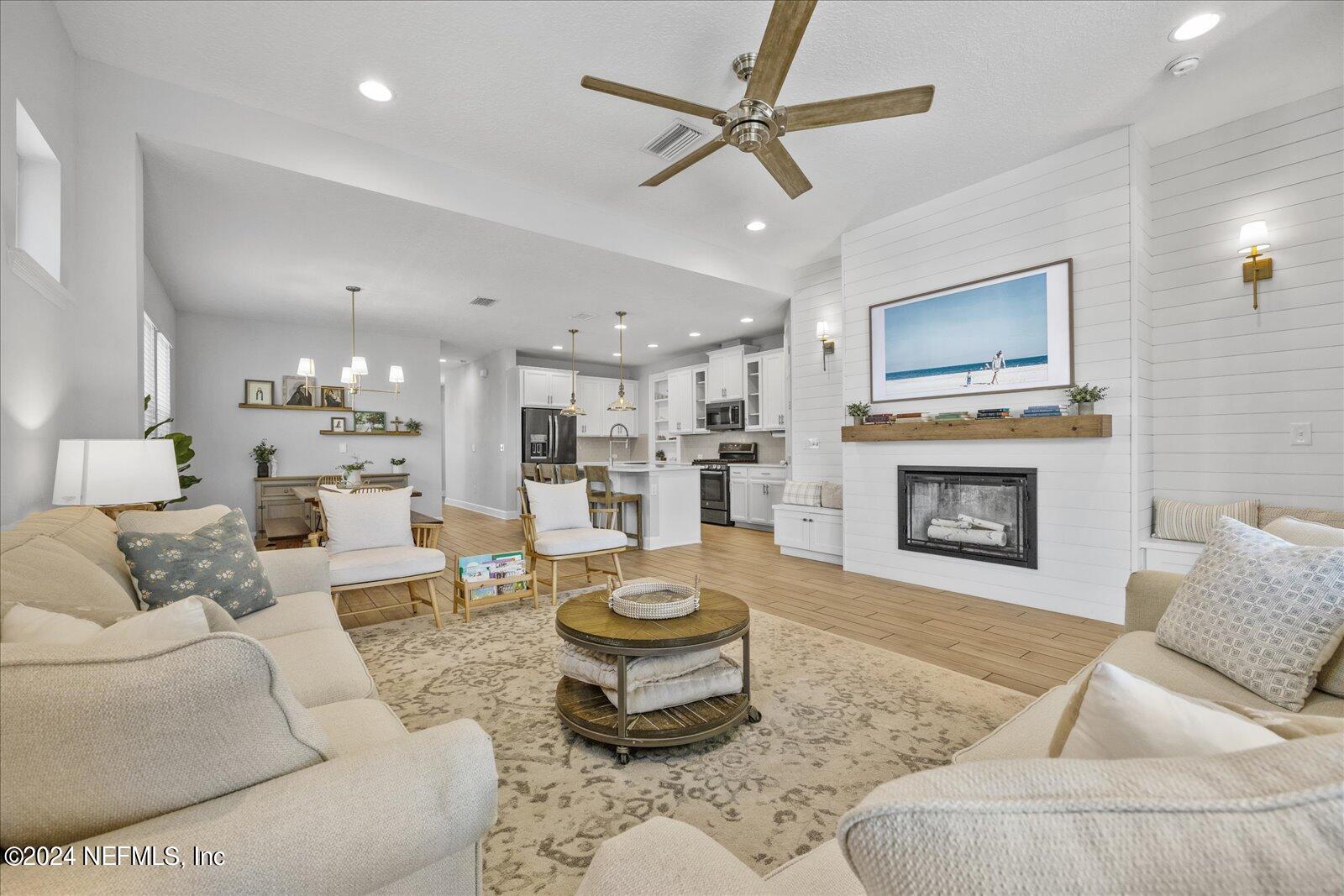 36 Foster Lane Ponte Vedra, FL 32081 - Photo 32 of 59 a living room with furniture and a fireplace