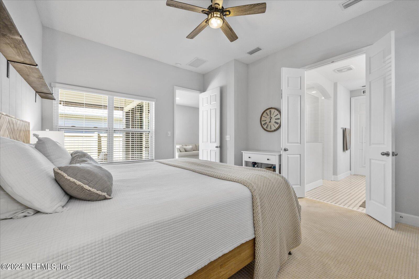 36 Foster Lane Ponte Vedra, FL 32081 - Photo 37 of 59 a bedroom with a bed and window