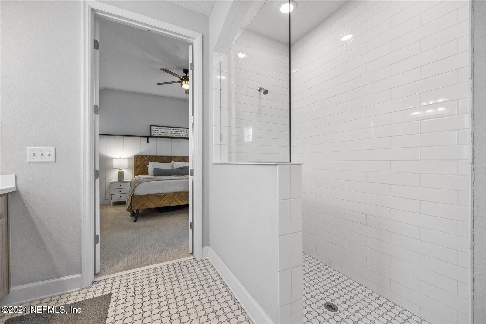 36 Foster Lane Ponte Vedra, FL 32081 - Photo 41 of 59 a en suite bathroom with a sink and a shower