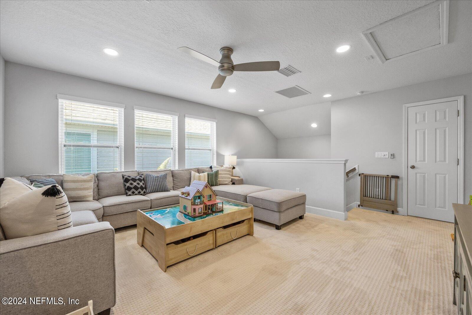 36 Foster Lane Ponte Vedra, FL 32081 - Photo 49 of 59 a living room with furniture and a large window