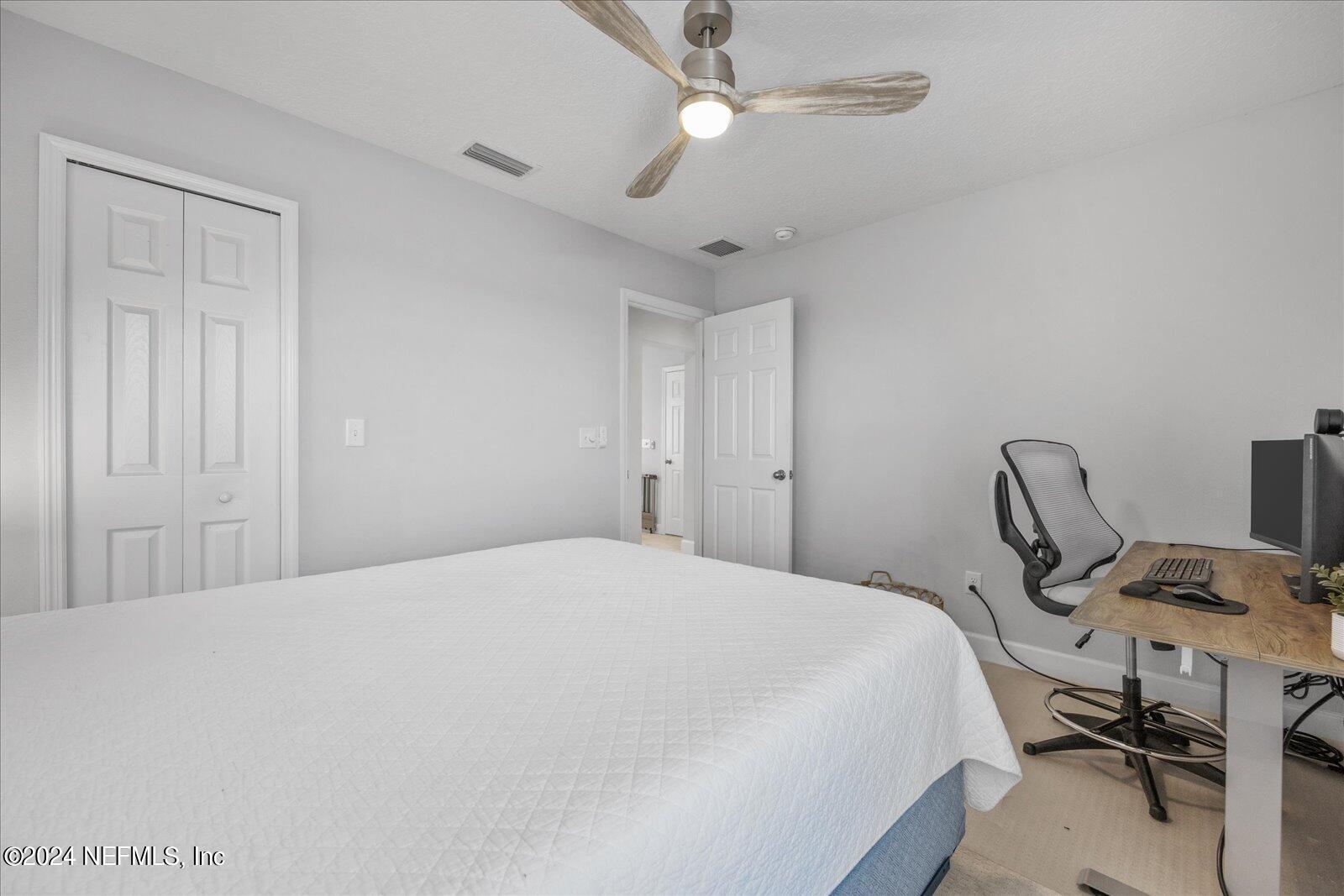 36 Foster Lane Ponte Vedra, FL 32081 - Photo 53 of 59 a bedroom with a bed and a desk