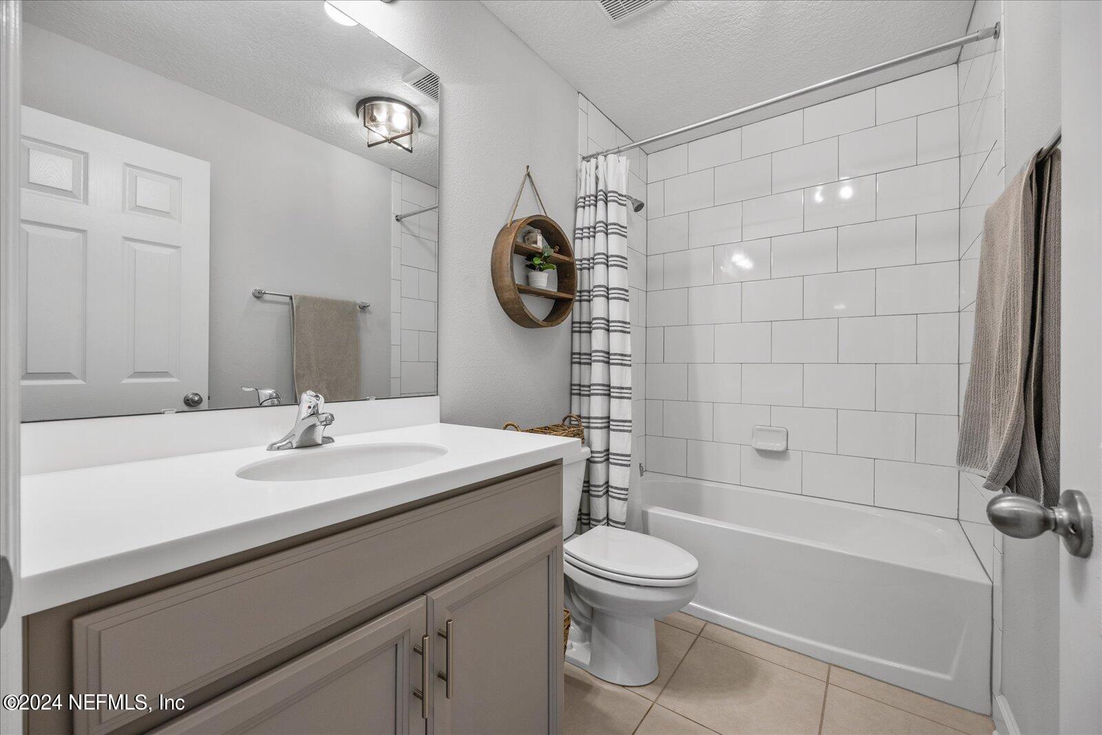 36 Foster Lane Ponte Vedra, FL 32081 - Photo 54 of 59 a bathroom with a sink a toilet and shower
