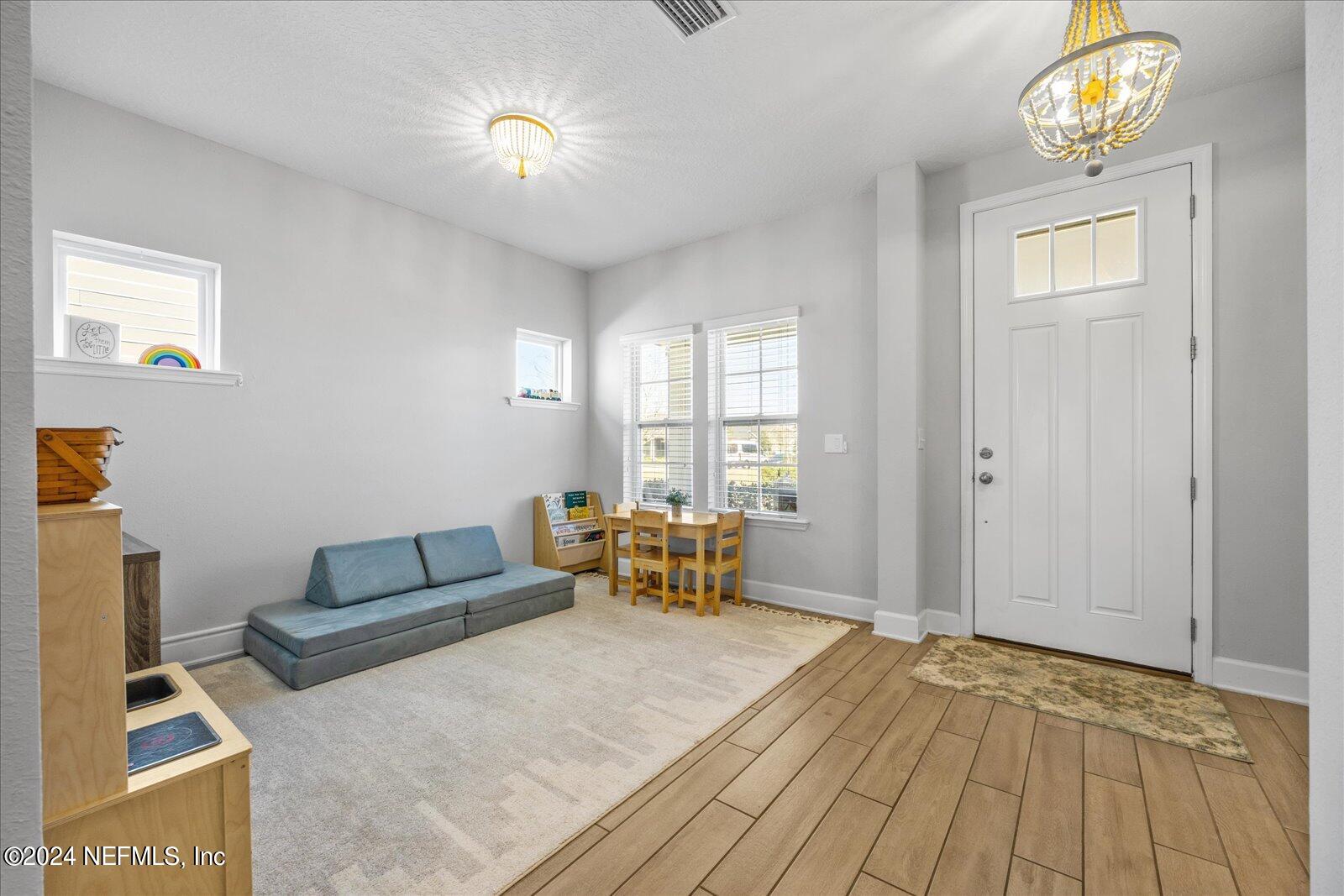 36 Foster Lane Ponte Vedra, FL 32081 - Photo 6 of 59 a bedroom with furniture and a window