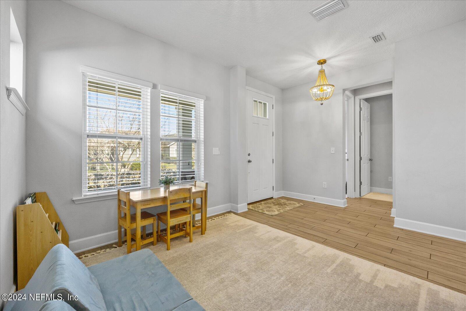 36 Foster Lane Ponte Vedra, FL 32081 - Photo 7 of 59 a view of a livingroom with workspace and a window