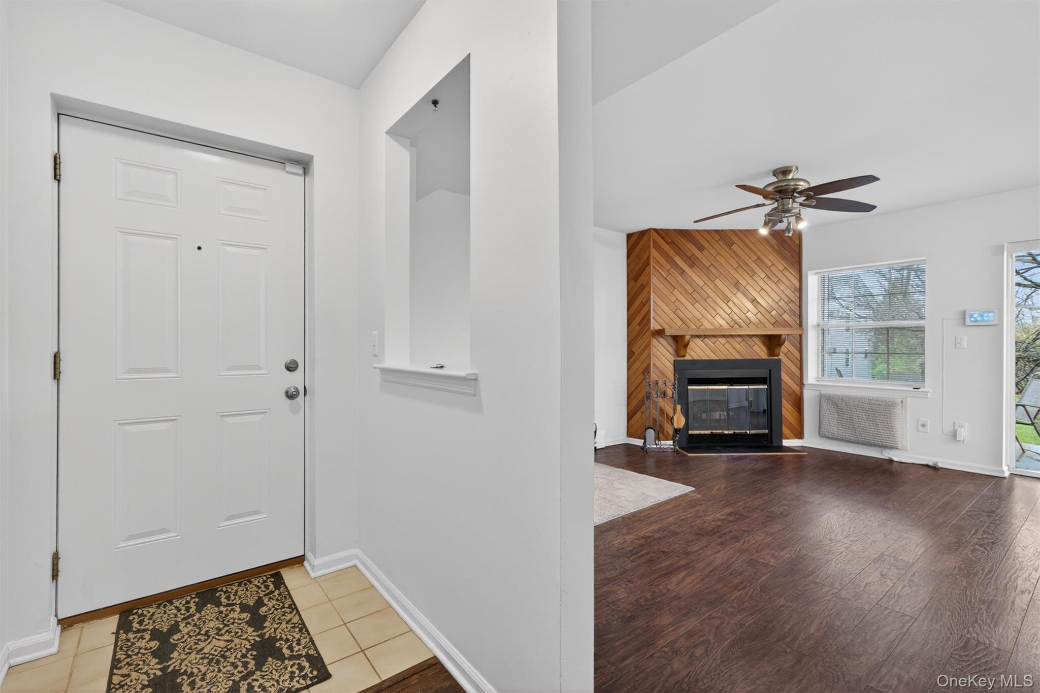 5 Lexington Hills Road, Unit 1 Harriman, NY 10926 - Photo 1 of 29 a view of a livingroom with wooden floor and a ceiling fan