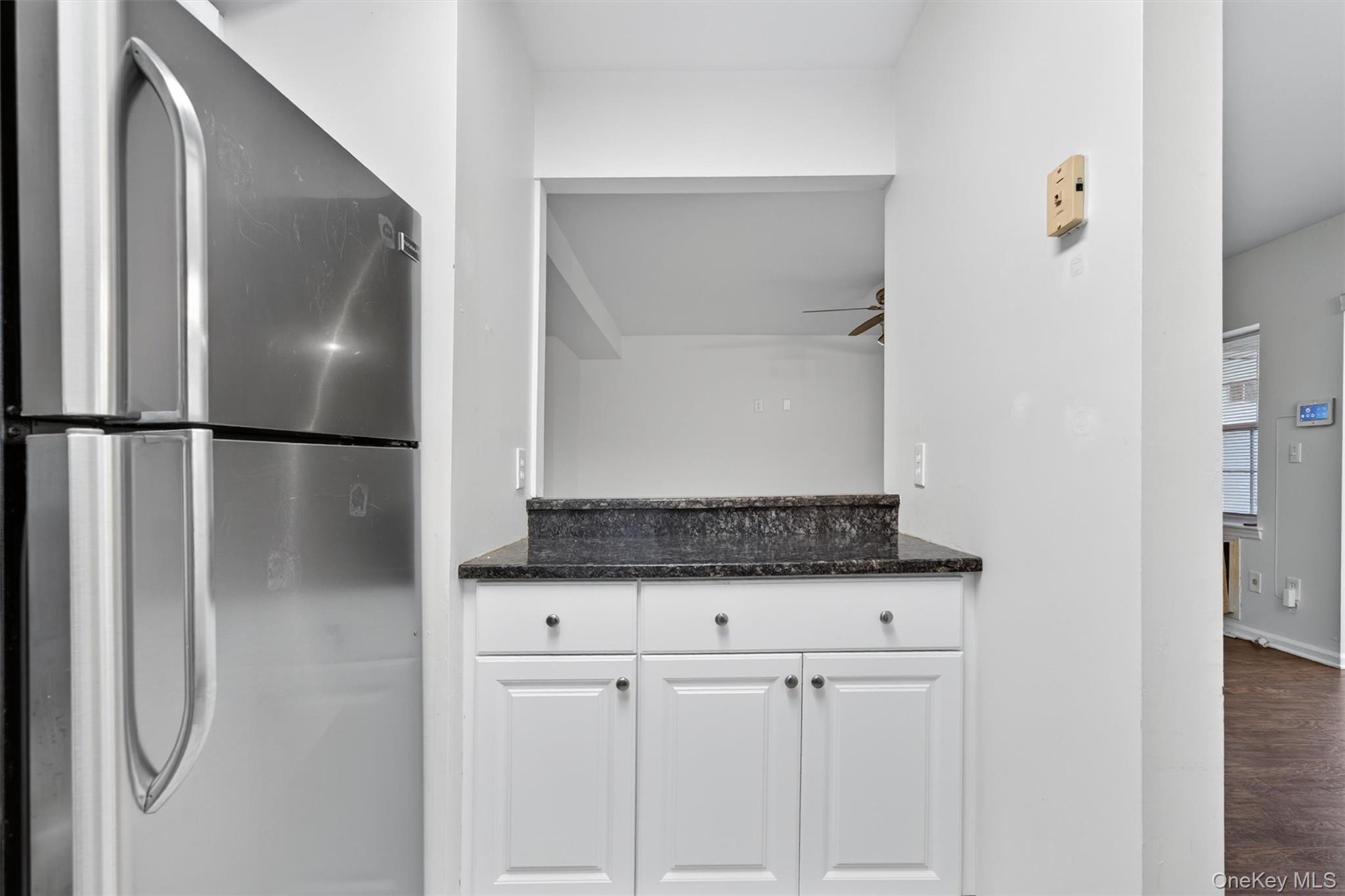 5 Lexington Hills Road, Unit 1 Harriman, NY 10926 - Photo 12 of 29 a view of a kitchen with a washer and dryer