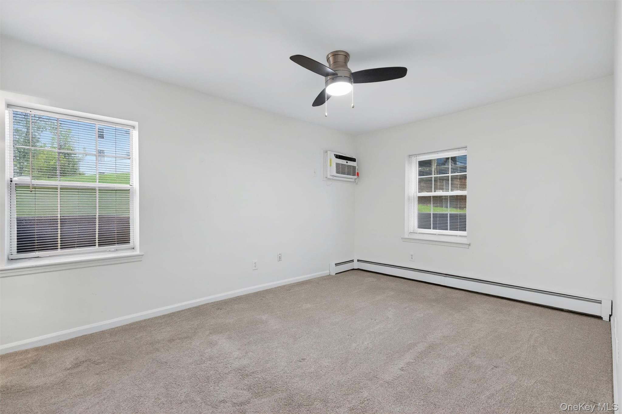 5 Lexington Hills Road, Unit 1 Harriman, NY 10926 - Photo 13 of 29 an empty room with a window