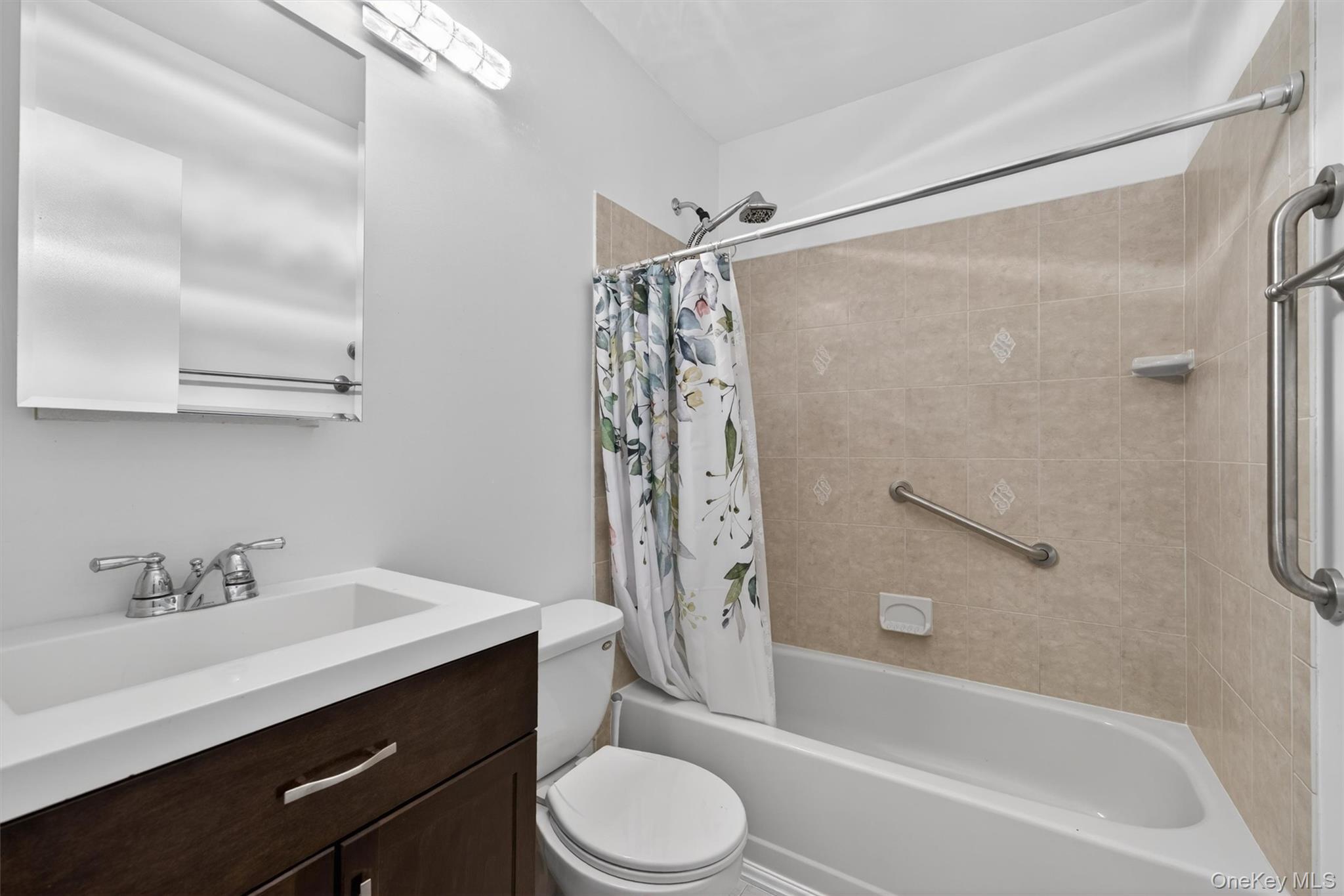 5 Lexington Hills Road, Unit 1 Harriman, NY 10926 - Photo 15 of 29 a bathroom with a sink toilet and shower