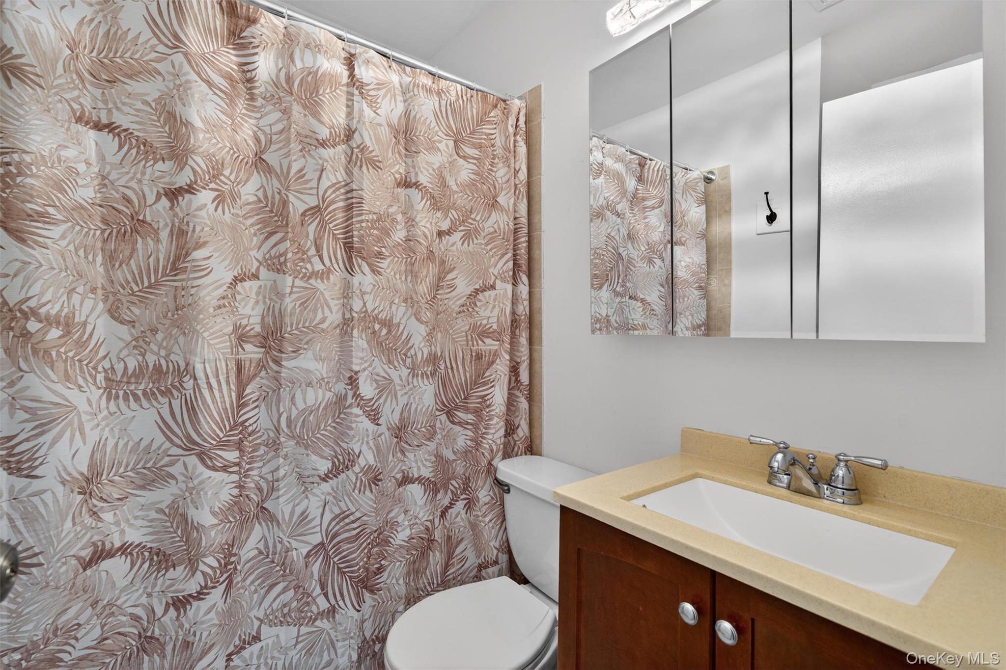 5 Lexington Hills Road, Unit 1 Harriman, NY 10926 - Photo 19 of 29 a bathroom with a granite countertop sink and a mirror