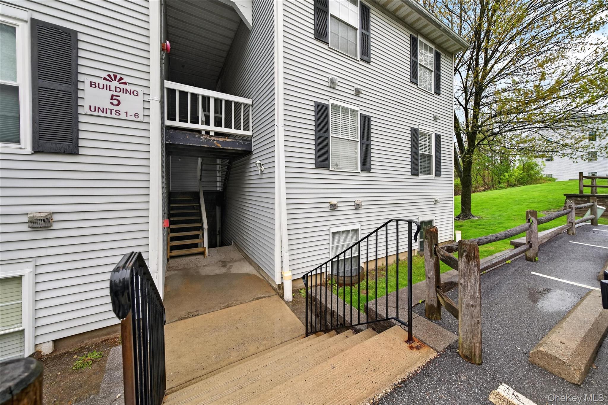 5 Lexington Hills Road, Unit 1 Harriman, NY 10926 - Photo 28 of 29 a view of a house with a wooden deck