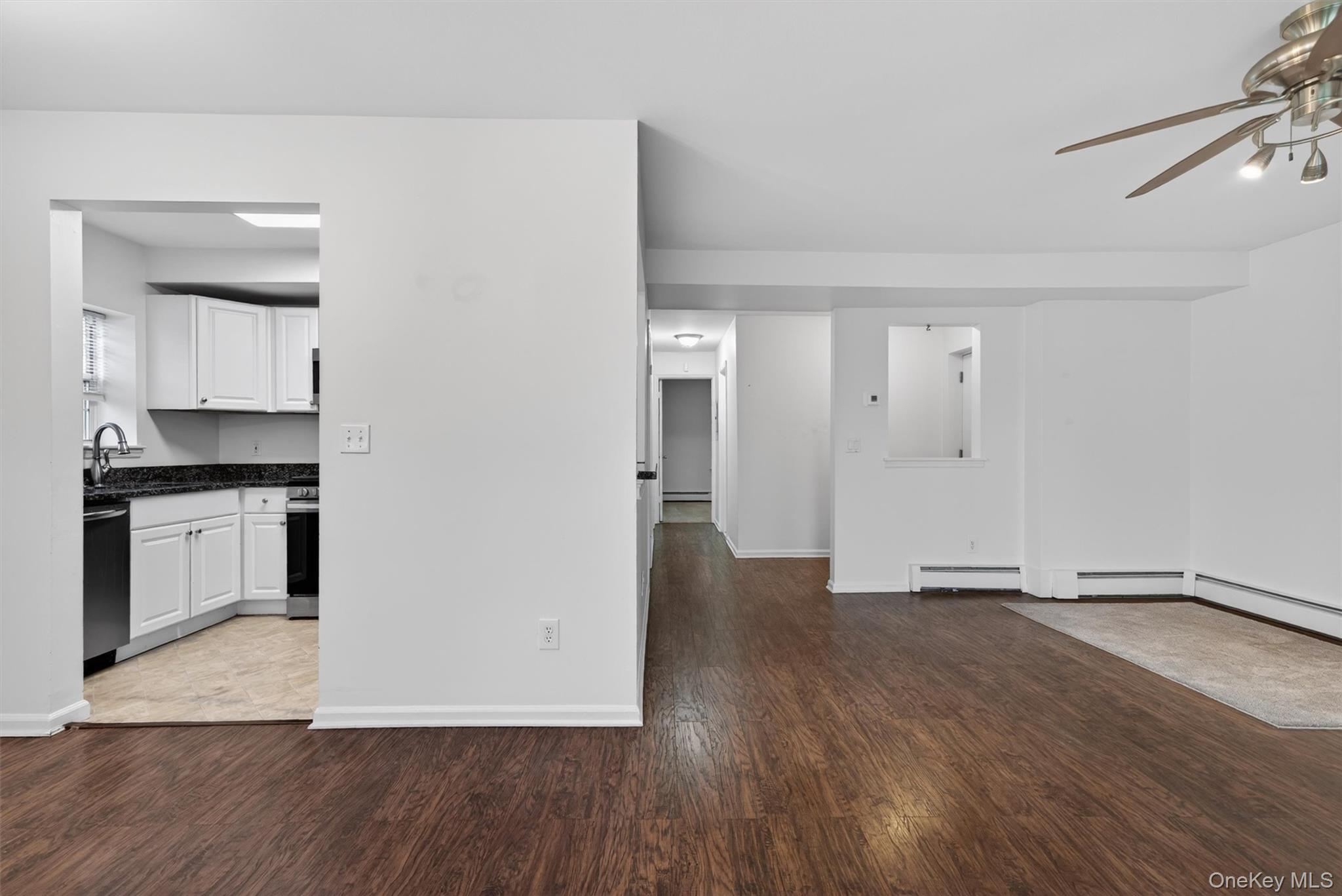 5 Lexington Hills Road, Unit 1 Harriman, NY 10926 - Photo 4 of 29 a view of a kitchen with wooden floor and a stove