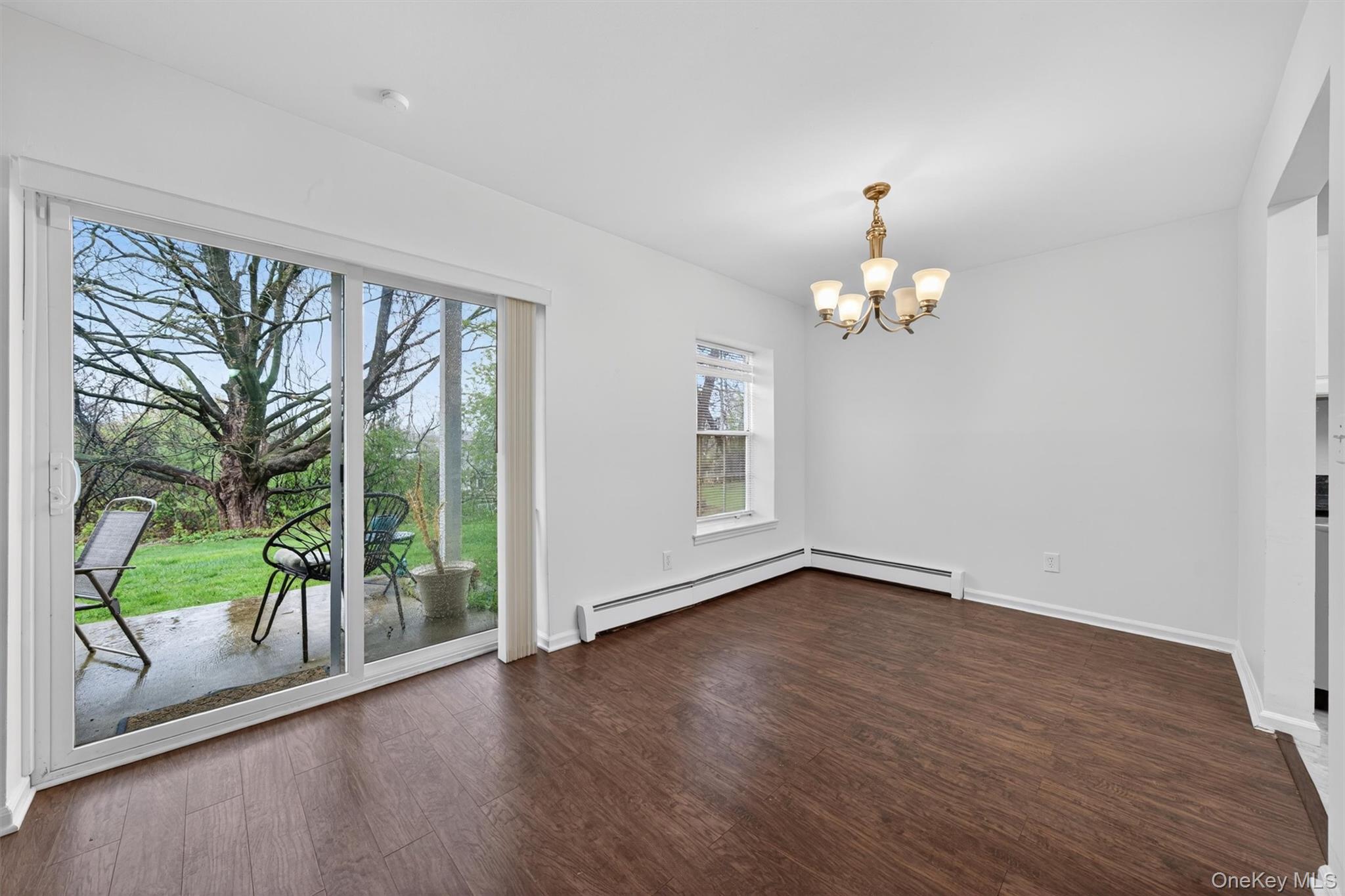 5 Lexington Hills Road, Unit 1 Harriman, NY 10926 - Photo 6 of 29 a view of livingroom with furniture and garden