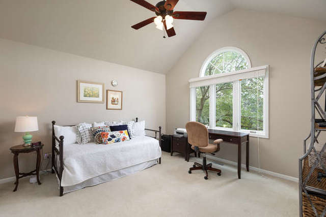 1572 White Eagle Drive Naperville, IL 60564 - Photo 20 of 33 a living room with furniture and a window