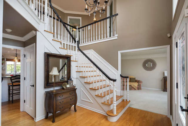 1572 White Eagle Drive Naperville, IL 60564 - Photo 23 of 33 a view of an entryway with workspace and windows