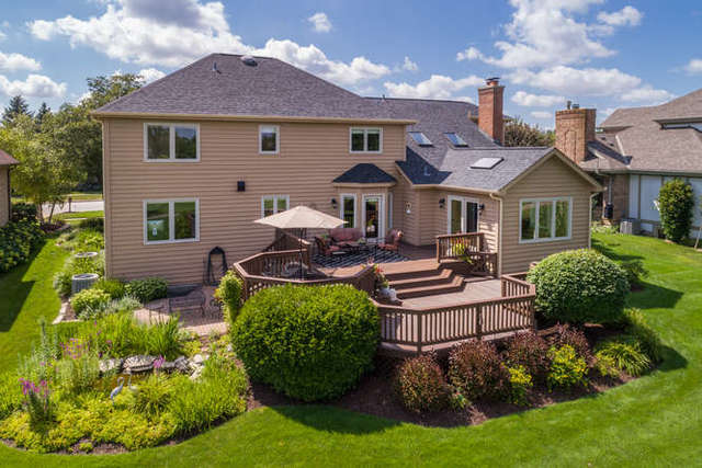 1572 White Eagle Drive Naperville, IL 60564 - Photo 29 of 33 a front view of a house with garden