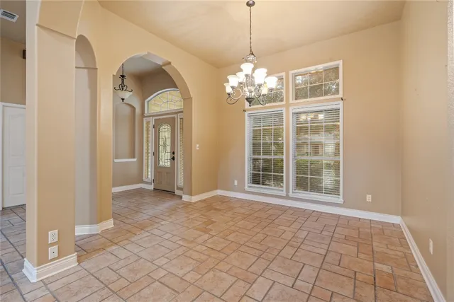 a view of a room with windows