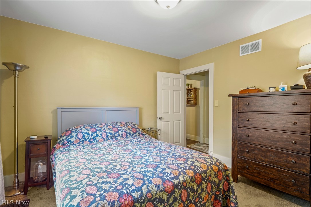 629 Clinton Street Niles, OH 44446 - Photo 17 of 50 Bedroom featuring neutral-toned walls, a white ceiling, and carpeted flooring