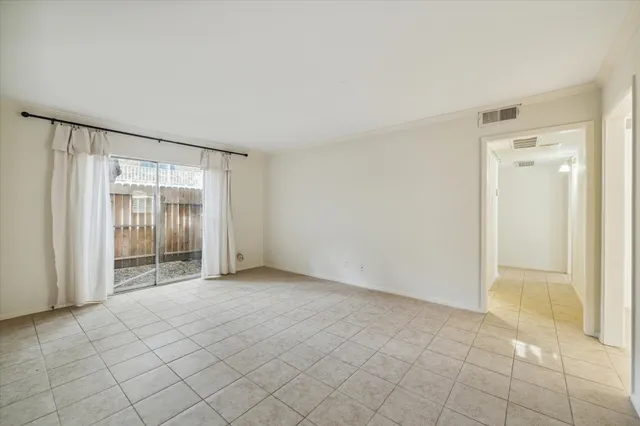 a view of an empty room with window