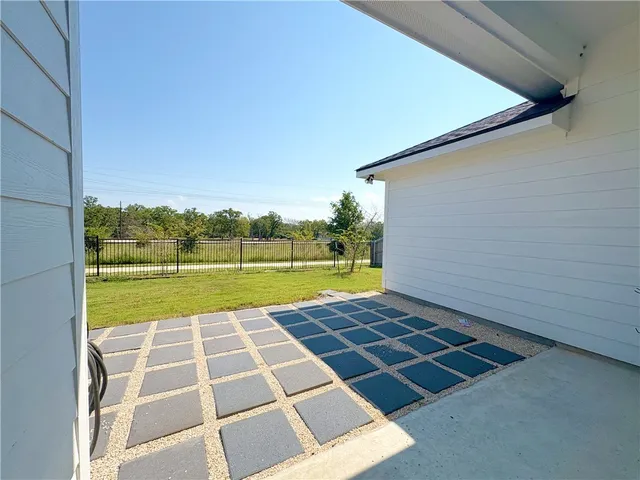 a view of a balcony with an outdoor space