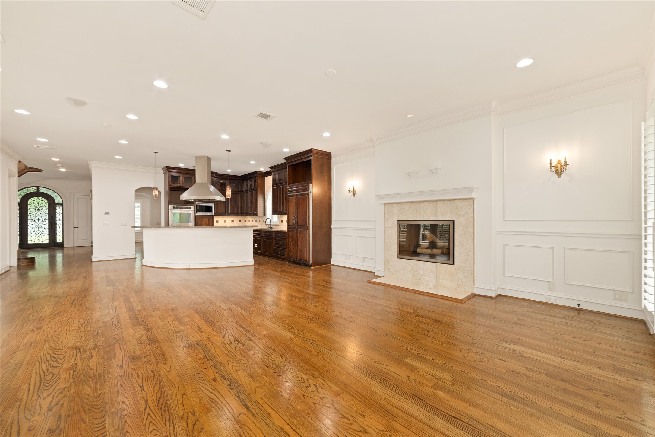 4102 Gramercy Street Houston, TX 77025 - Photo 9 of 35 a view of kitchen with furniture and a fireplace