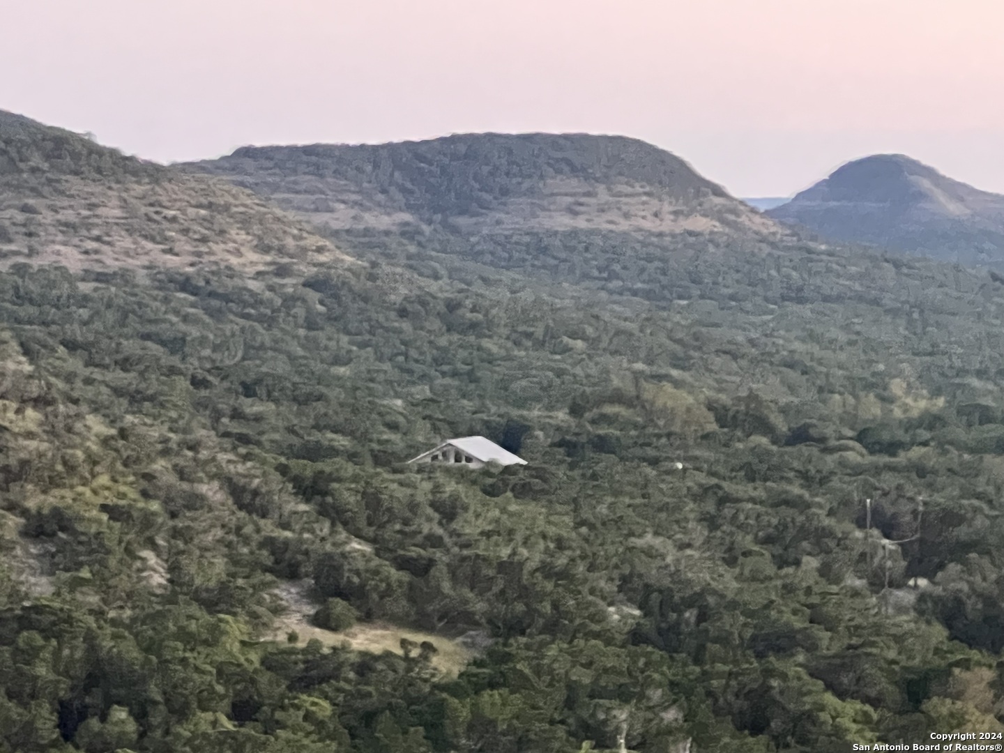 2150 The Low Road San Marcos, TX 78666 - Photo 5 of 6 a view of a mountain in the distance