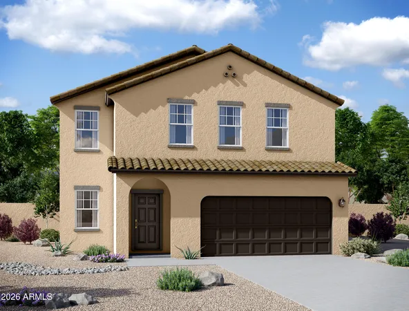a front view of a house with a garden and garage