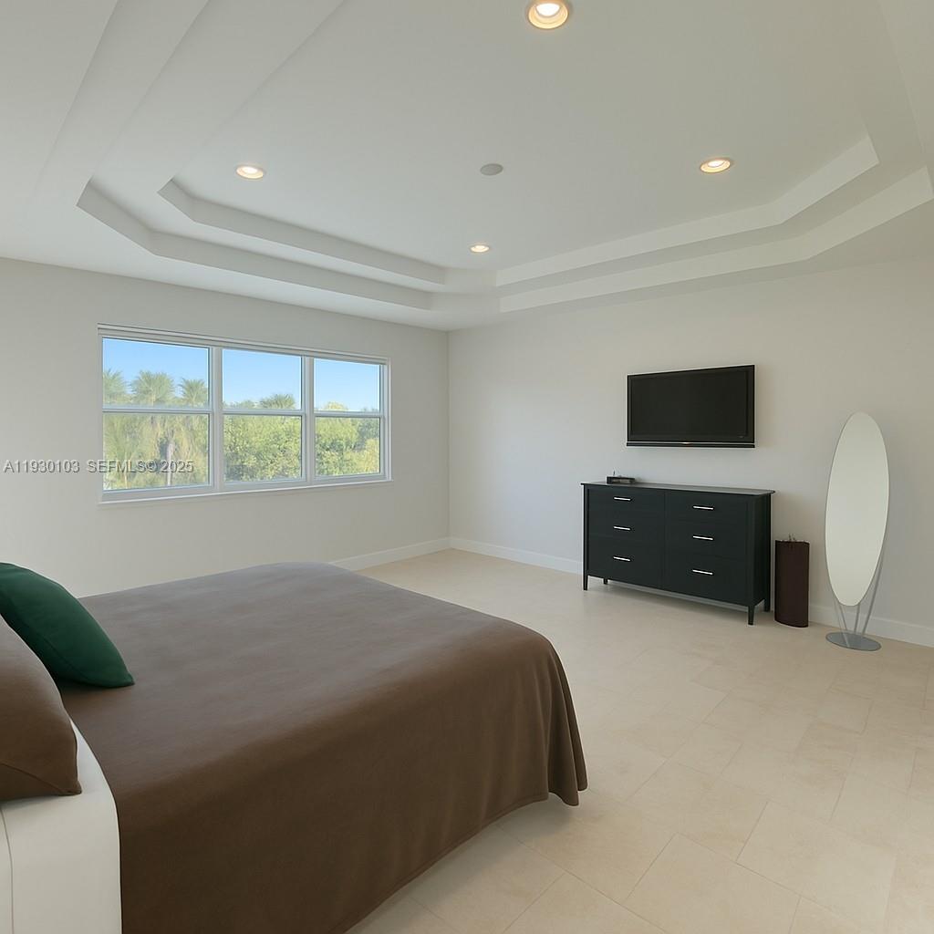 1490 Cleveland Road Miami Beach, FL 33141 - Photo 14 of 22 a bed room with a bed and a television