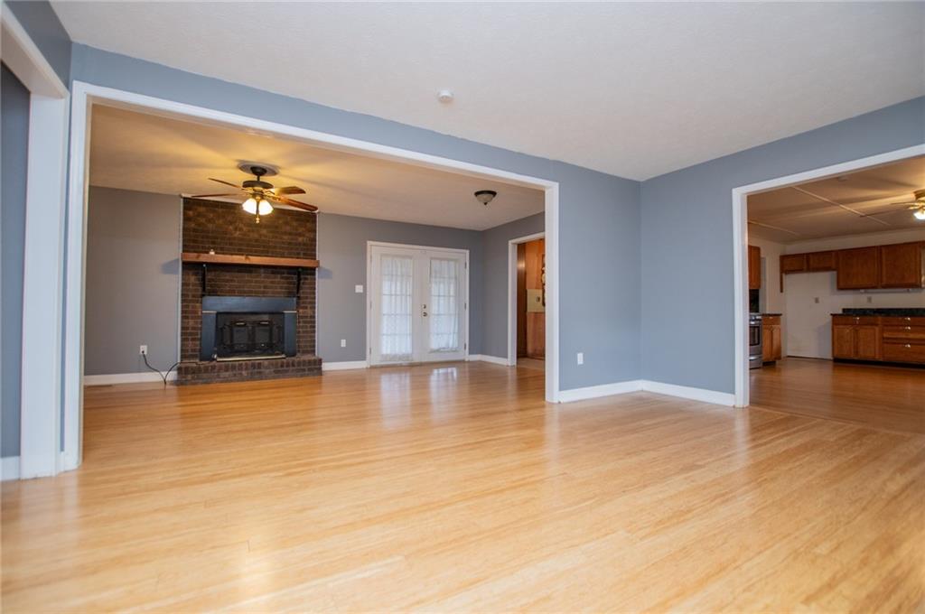 5166 Liberty Road Villa Rica, GA 30180 - Photo 15 of 52 a view of empty room with wooden floor