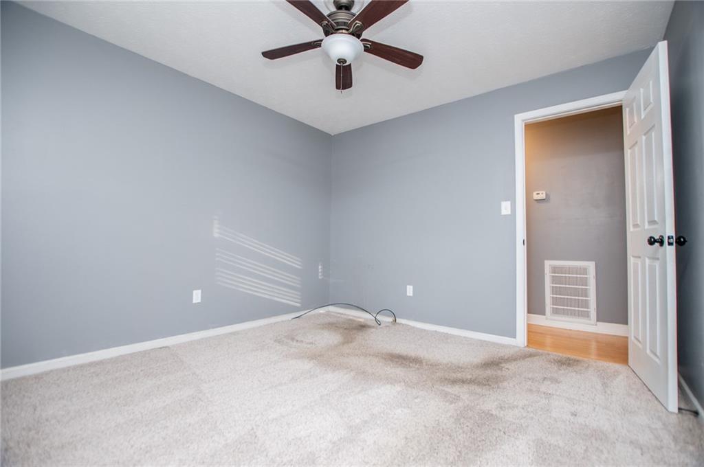 5166 Liberty Road Villa Rica, GA 30180 - Photo 37 of 52 a view of a room with a ceiling fan