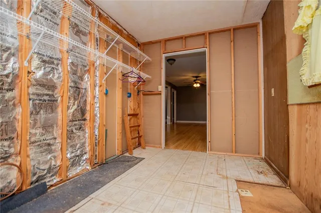 a view of a bathroom with a shower curtain
