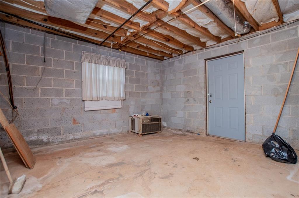 5166 Liberty Road Villa Rica, GA 30180 - Photo 42 of 52 a room with storage and utility