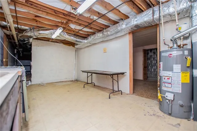 a view of an empty room with a bathroom