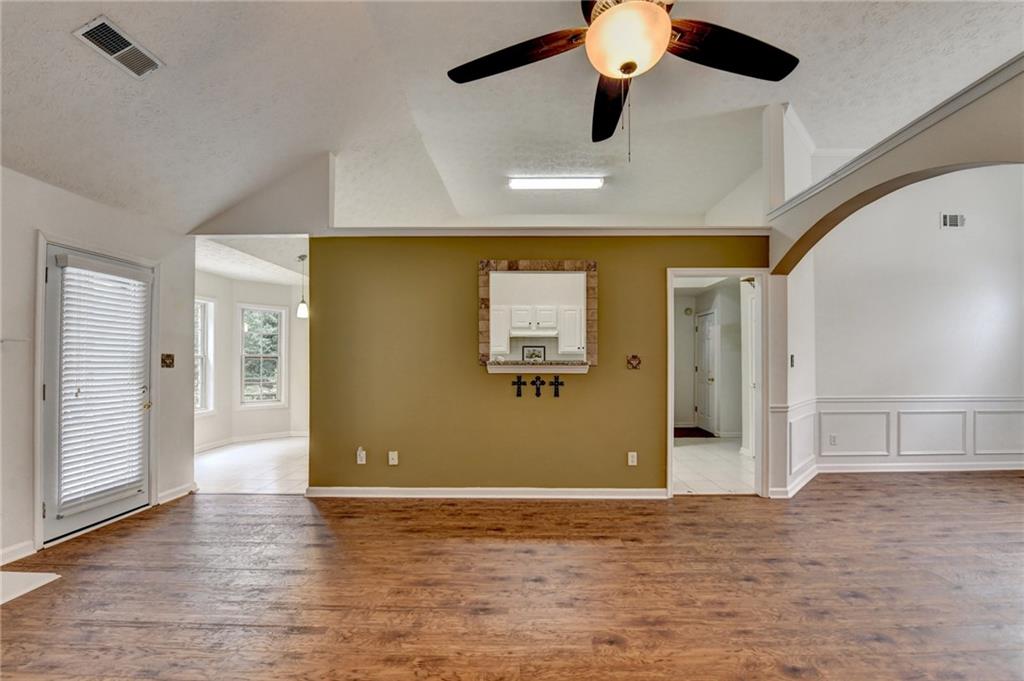 3555 Rivers End Place Buford, GA 30519 - Photo 13 of 49 a view of a livingroom with wooden floor