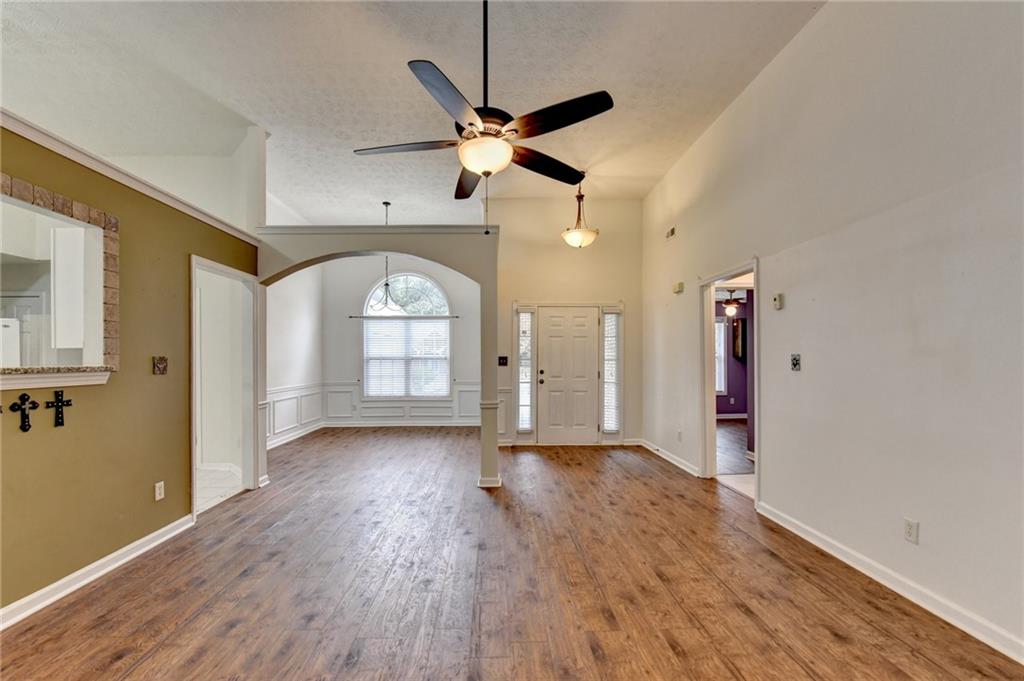 3555 Rivers End Place Buford, GA 30519 - Photo 15 of 49 a view of empty room with wooden floor