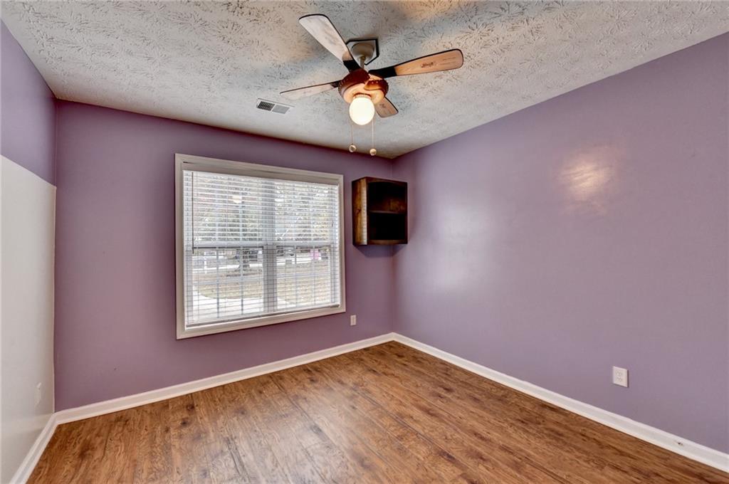 3555 Rivers End Place Buford, GA 30519 - Photo 31 of 49 a view of an empty room with a window