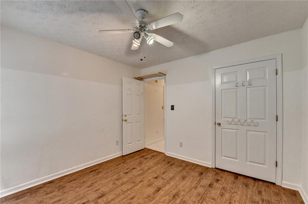 3555 Rivers End Place Buford, GA 30519 - Photo 39 of 49 wooden floor in an empty room