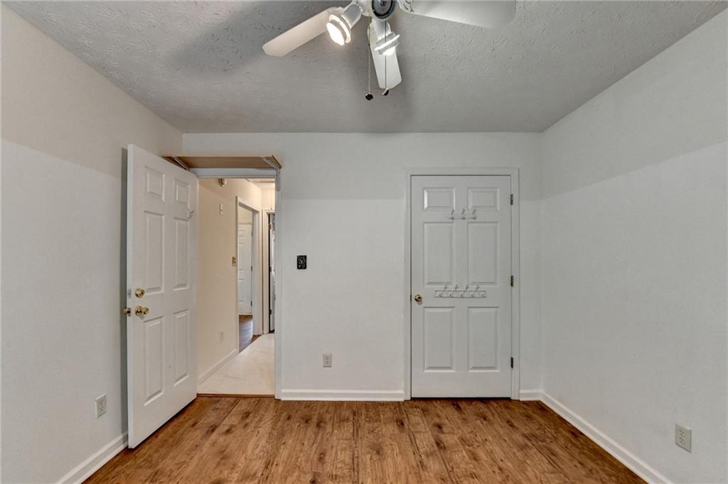 3555 Rivers End Place Buford, GA 30519 - Photo 40 of 49 a view of room with hardwood floor