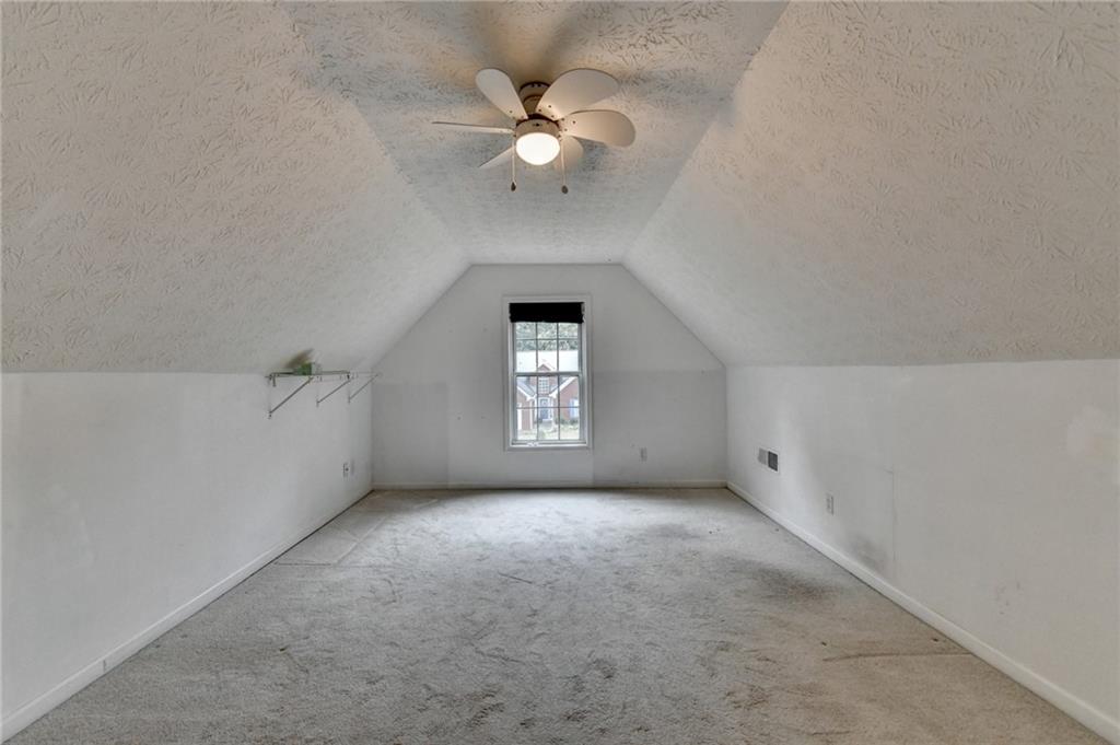 3555 Rivers End Place Buford, GA 30519 - Photo 41 of 49 wooden floor in an empty room with a window