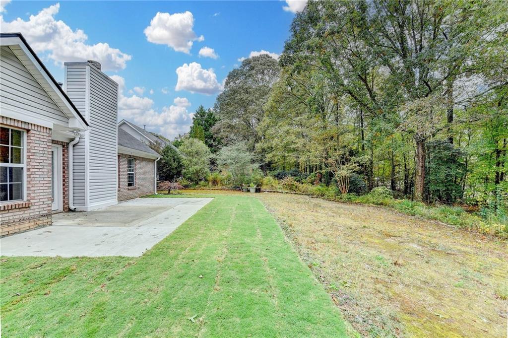 3555 Rivers End Place Buford, GA 30519 - Photo 46 of 49 a view of a backyard of the house
