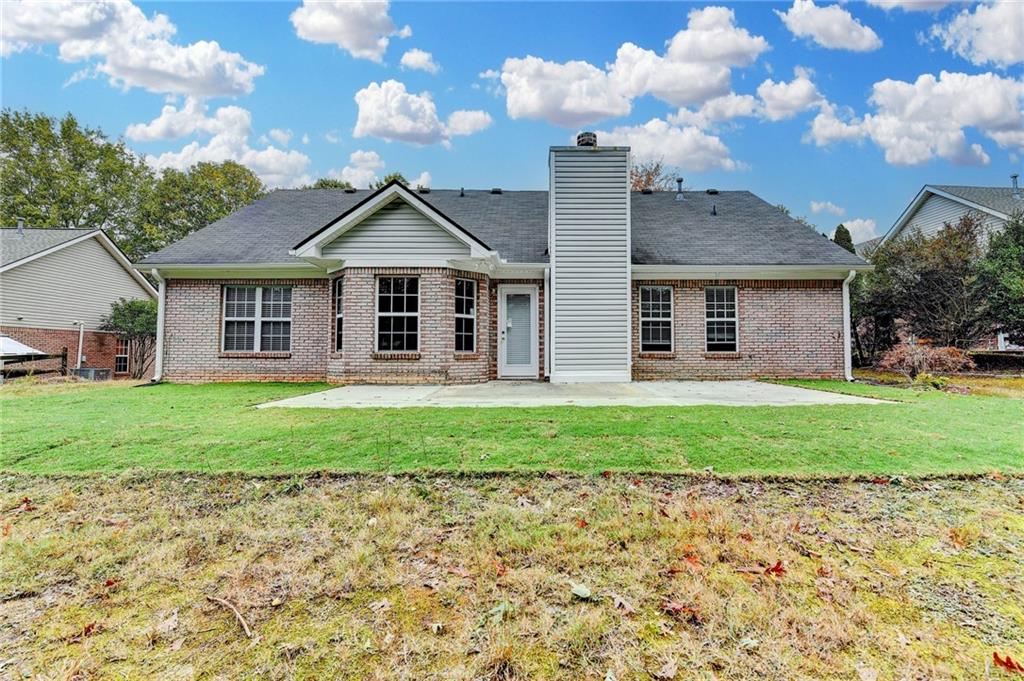 3555 Rivers End Place Buford, GA 30519 - Photo 48 of 49 a front view of a house with garden
