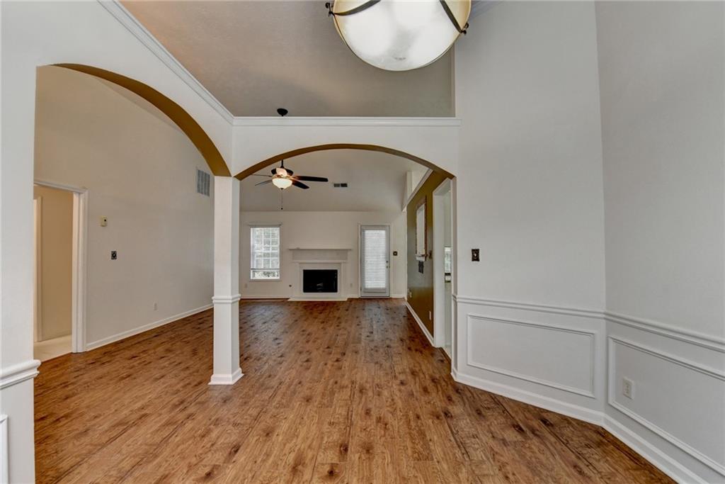 3555 Rivers End Place Buford, GA 30519 - Photo 9 of 49 a view of empty room with wooden floor