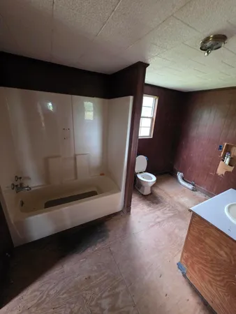 a bathroom with a sink and a toilet