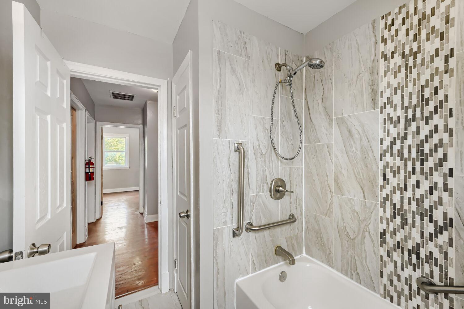 1014 Lyndhurst Street Baltimore, MD 21229 - Photo 23 of 29 a bathroom with a shower