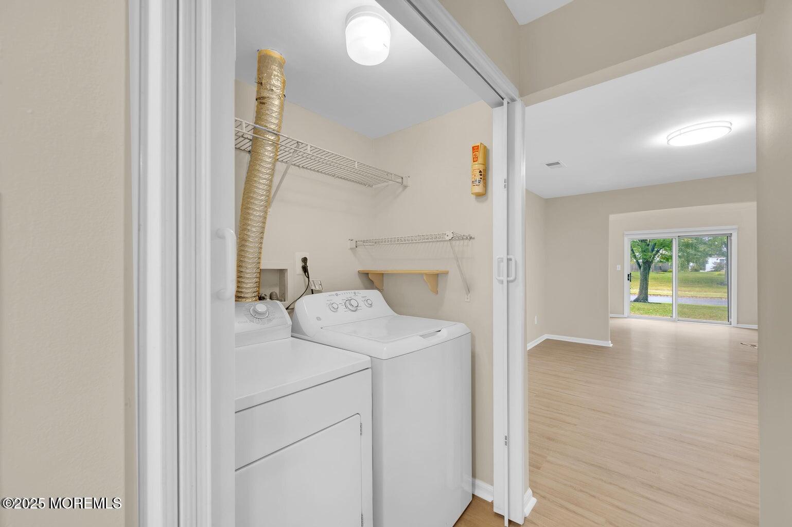 4 Cooper Court Freehold, NJ 07728 - Photo 12 of 23 a utility room with dryer and washer