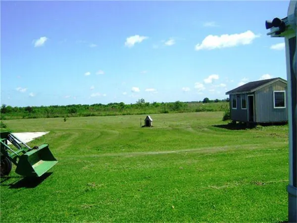 a green field with lots of green space in it