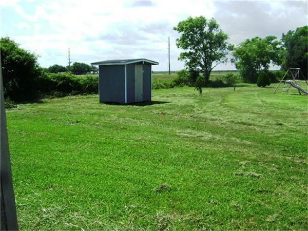 a fire hydrant in the middle of a field
