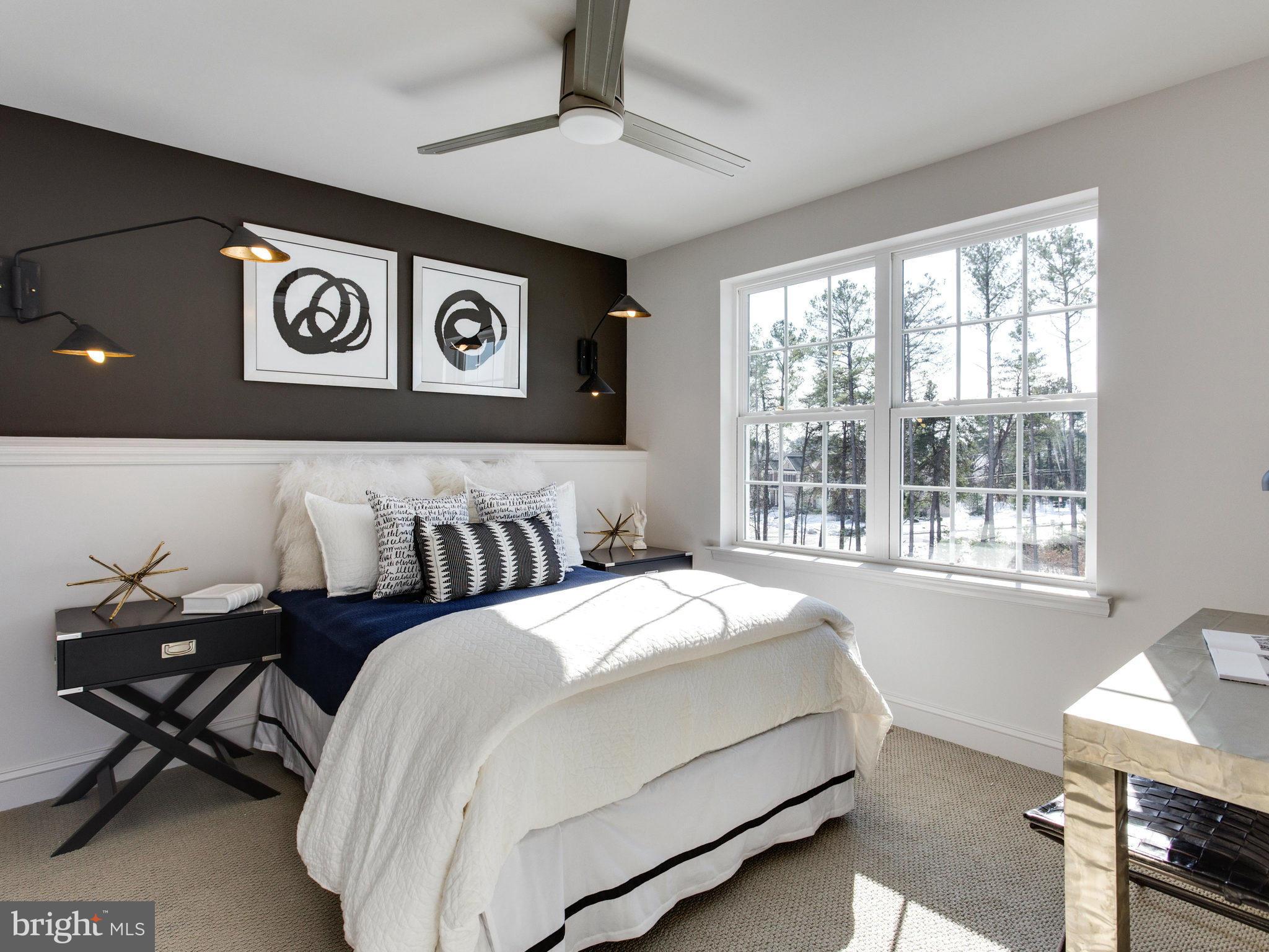 1709 Fieldstone Court Hanover, MD 21076 - Photo 12 of 19 a bed room with a bed and a chair