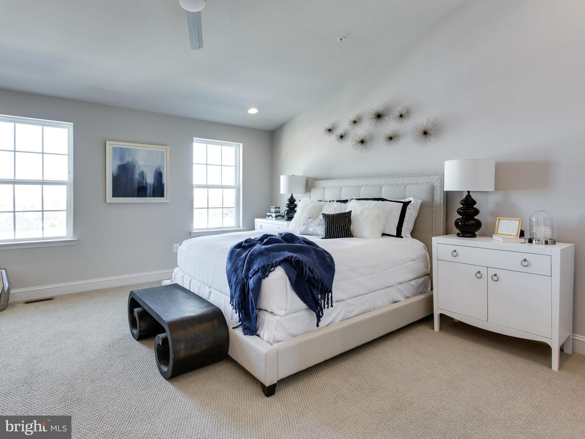 1709 Fieldstone Court Hanover, MD 21076 - Photo 14 of 19 a spacious bedroom with a bed and window
